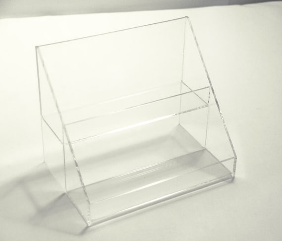 Custom acrylic plastic fabrication store displays jewelry trays brochure holders showcases racks shelves plexiglas lucite exhibits covers