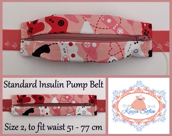 Pink games controllers insulin pump belt with pink and white pawprint elastic.  Size 2.