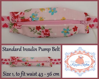 Pink floral insulin pump belt with pink and white hearts elastic. Size 1 (age 2 - approximately age 9).