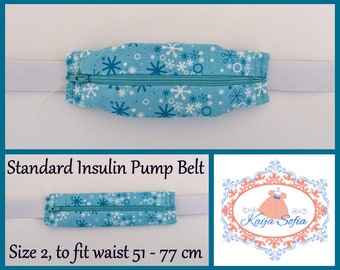 Turquoise and white snowflakes insulin pump belt with plain white elastic.  Size 2.