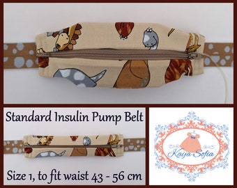 Dinosaurs on brown insulin pump belt with brown and grey spotty elastic. Size 1 (age 2 - approximately age 9).