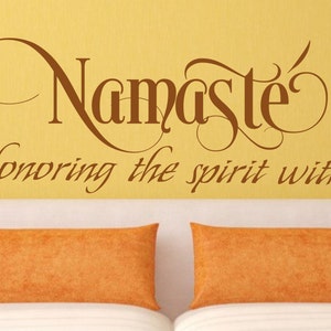 May include: A brown wall decal with the text "Namaste" in a decorative font, and the text "Honoring the spirit within" in a smaller font below.