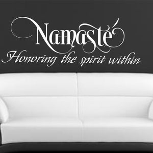 May include: White vinyl wall decal with the text "Namaste" in a decorative font and the phrase "Honoring the spirit within" in a smaller font.