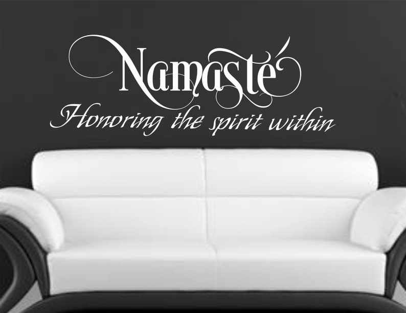May include: White vinyl wall decal with the text "Namaste" in a decorative font and the phrase "Honoring the spirit within" in a smaller font.
