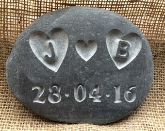Love PEBBLE with initials carved into the hearts! along with a date, all hand carved into the stone &  personalised