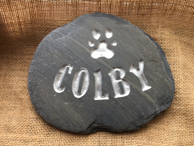 Perfect memorial for a beloved pet finished with a waterproof silver personalised hand sketched then carved into natural stone