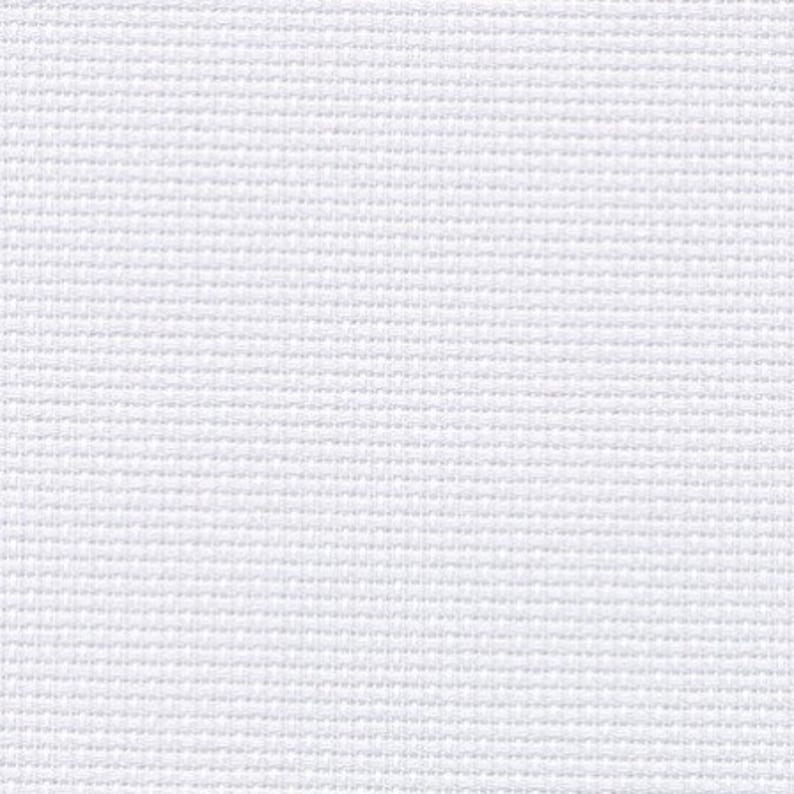 May include: White fabric with a fine, woven texture. The fabric has a smooth, even surface and a slightly off-white colour.