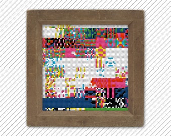 May include: A framed artwork with a colorful pixelated design. The artwork is made up of small squares of different colors, including red, blue, green, yellow, and pink. The artwork is framed in a brown wooden frame.