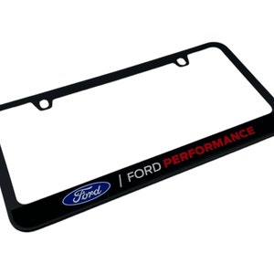 May include: Black license plate frame with the Ford logo in blue and the words FORD PERFORMANCE in red. The frame is rectangular with rounded corners and has mounting holes.