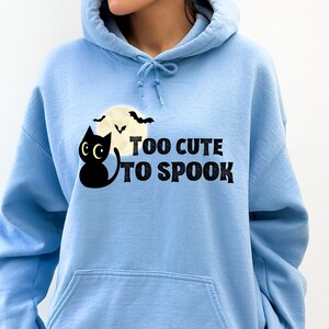 Too cute to spooky hoodie, cozy fall hoodie, spooky season hoodie, black cat hoodie, gift for cat lover, black cat lover, cat lover gift