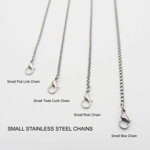 May include: Four different types of small stainless steel chains: flat link, twist curb, rolo, and box. Each chain has a lobster clasp.