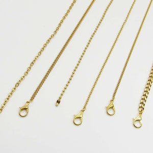 May include: Six gold chains of different styles and lengths, all with lobster claw clasps.