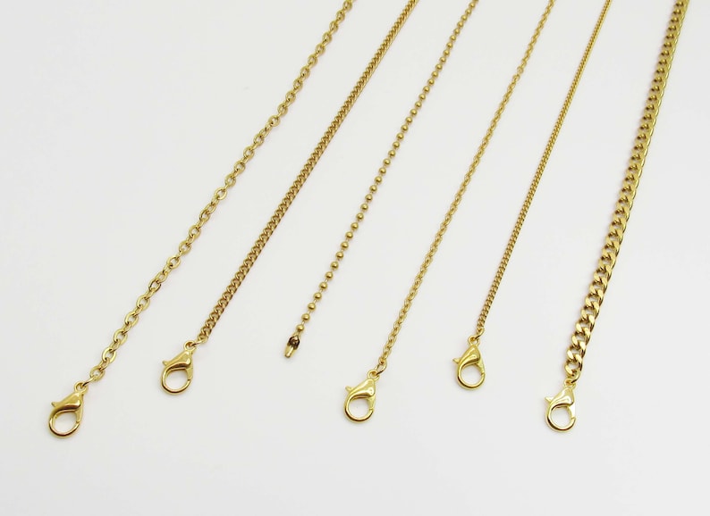 May include: Six gold chains of different styles and lengths, all with lobster claw clasps.