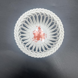 May include: A rustic wooden sign with the text "Welcome to our home" in white lettering. The sign features a distressed finish and a simple, inviting design, perfect for entryway decor.