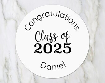 May include: White round sticker with black text that reads "Congratulations Class of 2025 Daniel".
