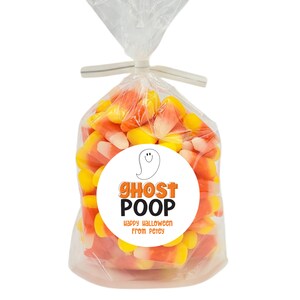 May include: A clear plastic bag filled with orange and yellow candy corn. A white circle sticker with a black outline of a ghost with a smiley face is on the bag. The sticker says "Ghost Poop" in orange letters and "Happy Halloween from Petey" in black letters.
