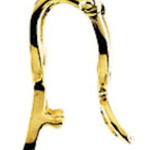 May include: A gold-colored earring hook, curved in an arch shape. The hook has a decorative element at the top and a small, angled extension at the bottom. The metal has a shiny finish.