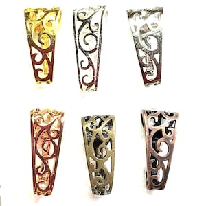 May include: A set of six metal jewelry bails arranged in two rows. Each bail features an intricate, openwork filigree scroll pattern. The collection includes various metallic finishes, including gold, silver, copper, and antique bronze tones.