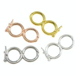 May include: Four infinity-shaped clasps in gold, silver, and rose gold. Each clasp has two connected circular loops and a small lever for opening and closing. The clasps are designed for jewelry making.