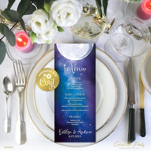 May include: A blue and purple wedding menu card with a white moon and stars. The menu includes a starter, main course, and dessert. The card is personalized with the names "Kaitlyn & Andrew" and the date "6.15.2024".