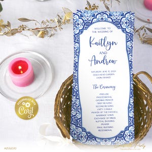 May include: A blue and white wedding ceremony program with a decorative border. The program includes the names Kaitlyn and Andrew, the date June 15, 2024, and the location Gold Head Garden, Lyon France. The ceremony order is listed below.