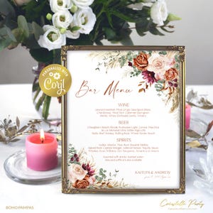 May include: A printable bar menu with a floral design in shades of pink, red, and orange. The menu lists wine, beer, and spirits options. The text at the top reads "Bar Menu". The text at the bottom reads "Kaitlyn & Andrew".