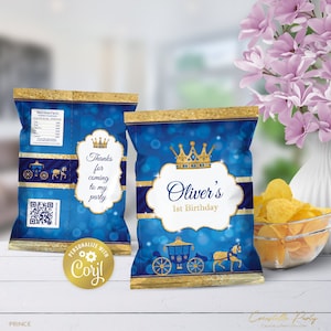 May include: Blue and gold party favour bags with a crown and carriage design. The bags say "Oliver's 1st Birthday" and "Thanks for coming to my party".