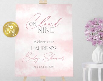 May include: Pink and white watercolor baby shower sign with the text "On Cloud Nine" and "Welcome to Lauren's Baby Shower August 17, 2024".