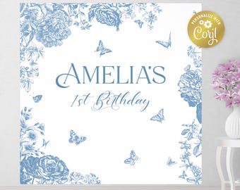 Puede incluir: Un telón de fondo floral azul y blanco con mariposas y el texto "Amelia's 1st Birthday".
