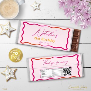 May include: Pink and gold chocolate bar wrapper with the text "Natalie's 21st Birthday 08-16-25" and a QR code. The wrapper has a decorative border and a "Thank you for coming" message.