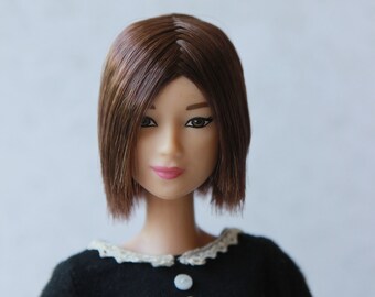 barbie with short brown hair