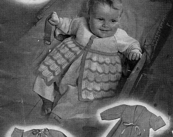 May include: Vintage black and white advertisement for baby clothes. The image features a baby wearing a knitted coat, with illustrations of four different matinee coats. Text reads "FOUR MATINEE COATS for the first six months."