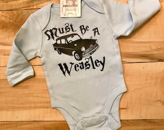 HarryPotter Inspired "Must Be A Weasley" Baby blue long sleeved onesie