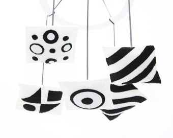 Black and white monochrome baby mobile, perfect as a gender-neutral baby shower gift and ideal as a newborn's first toy