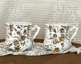 Antique Rococo Porcelain Coffee Cups: Gold Trim, 3D Flowers, Set of 2