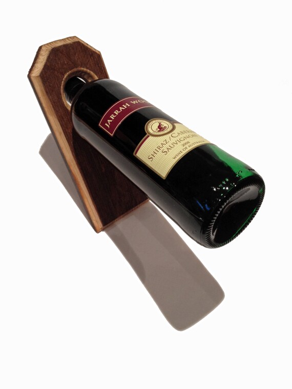 Items similar to Handmade Balanced Wine Bottle Holder SALE on Etsy
