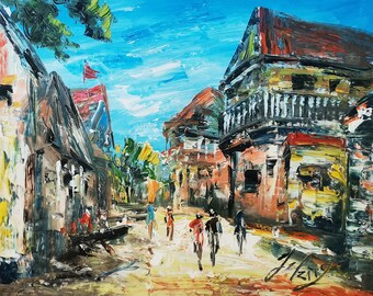 May include: A colorful oil painting depicting a street scene in a town. The buildings are painted in shades of red, yellow, and blue, and there are people walking on the street. The sky is a bright blue with white clouds.