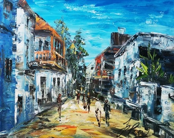 May include: A colorful oil painting depicting a street scene with buildings on both sides of the street. The buildings are painted in shades of blue, white, and orange. There are people walking down the street, and the sky is a bright blue with white clouds.