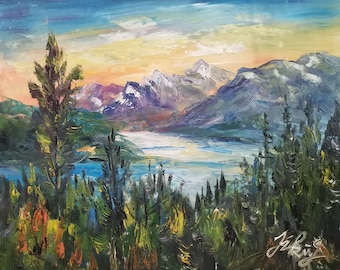 May include: A painting of a mountain landscape with a lake in the foreground. The mountains are purple and blue, and the lake is a light blue. There are trees in the foreground, and the sky is a light blue with yellow clouds.