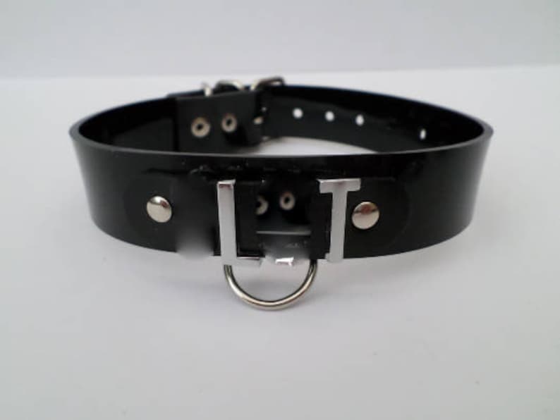 black pvc fetish collar 24mm wide with a standard roller image 1