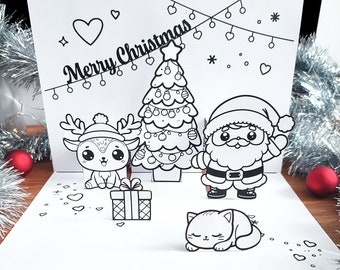May include: A black and white pop-up card with a Christmas theme. The card features a Christmas tree, Santa Claus, a reindeer, a cat, and a gift box. The card says "Merry Christmas" at the top.