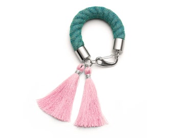 HELLEBORE silk tassel bracelet. Pastel blue + baby pink. tassel bracelet. rope bracelet. cord bracelet. bold jewelry. statement jewelry