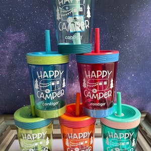 May include: Six colorful, reusable, plastic cups with straws and lids. Each cup has a white graphic of a camper with the text "Happy Camper" and the brand name "contigo".