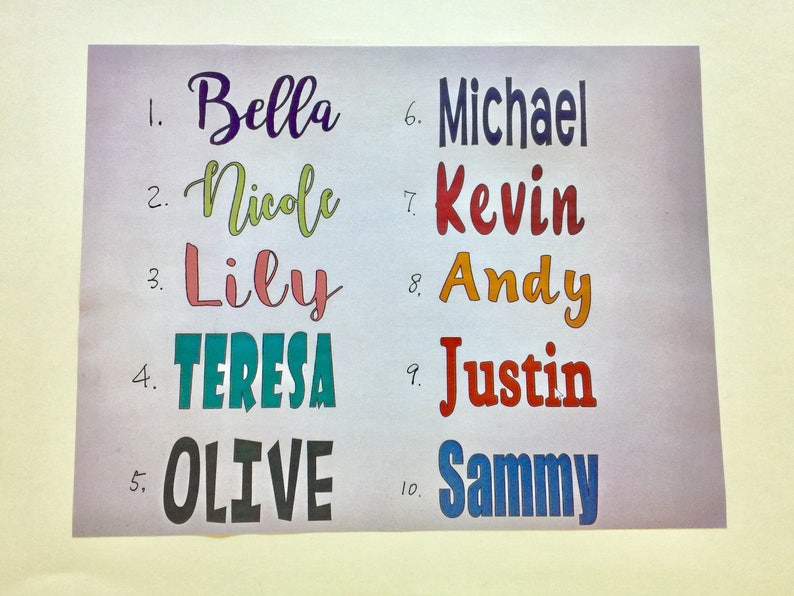 May include: A list of names written in colorful lettering on a white background. The names are: Bella, Nicole, Lily, Teresa, Olive, Michael, Kevin, Andy, Justin, and Sammy.