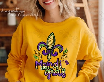 May include: A yellow sweatshirt with a purple, green, and gold Mardi Gras fleur-de-lis design and the text "Mardi Gras".