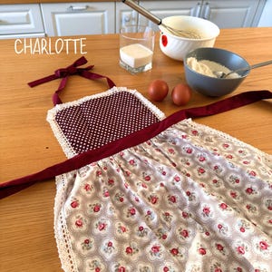 Flat lay of handmade personalized matching apron for girls and women