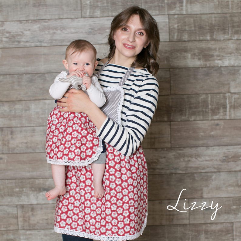 Toddler and mum wearing matching red polka dot aprons, mother and daughter set.