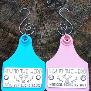 New To The Herd - Cattle Cow Livestock Ear Tag - First Christmas Ornament - New Baby - Cute Photo Prop - Cowboy - Cowgirl