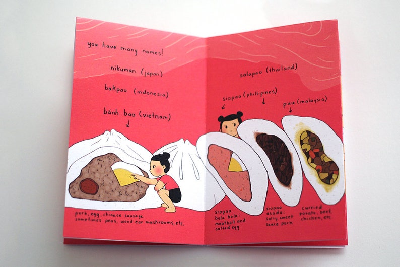 May include: Illustration of a steamed bun with different fillings. The bun is called "you have many names!" and has different names in different languages, including "nikuman" (Japan), "bakpao" (Indonesia), "b&aacute;nh bao" (Vietnam), "salapao" (Thailand), "siopao" (Philippines), and "pau" (Malaysia).