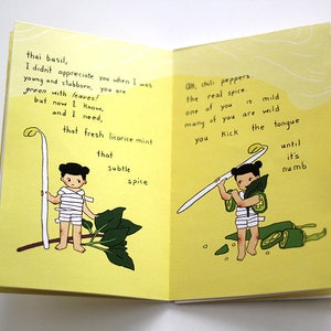 May include: An open book with illustrations and text on yellow pages. One page shows a figure with a plant, the other with chili peppers. Text includes "thai basil" and "chili peppers, the real spice."
